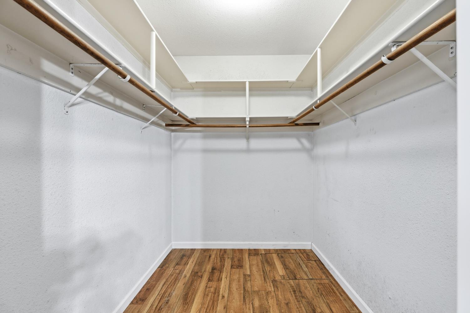 1416 Buttonwillow Drive Modesto, CA 95355 - Photo 23 of 39 a view of a room with racks on the wall