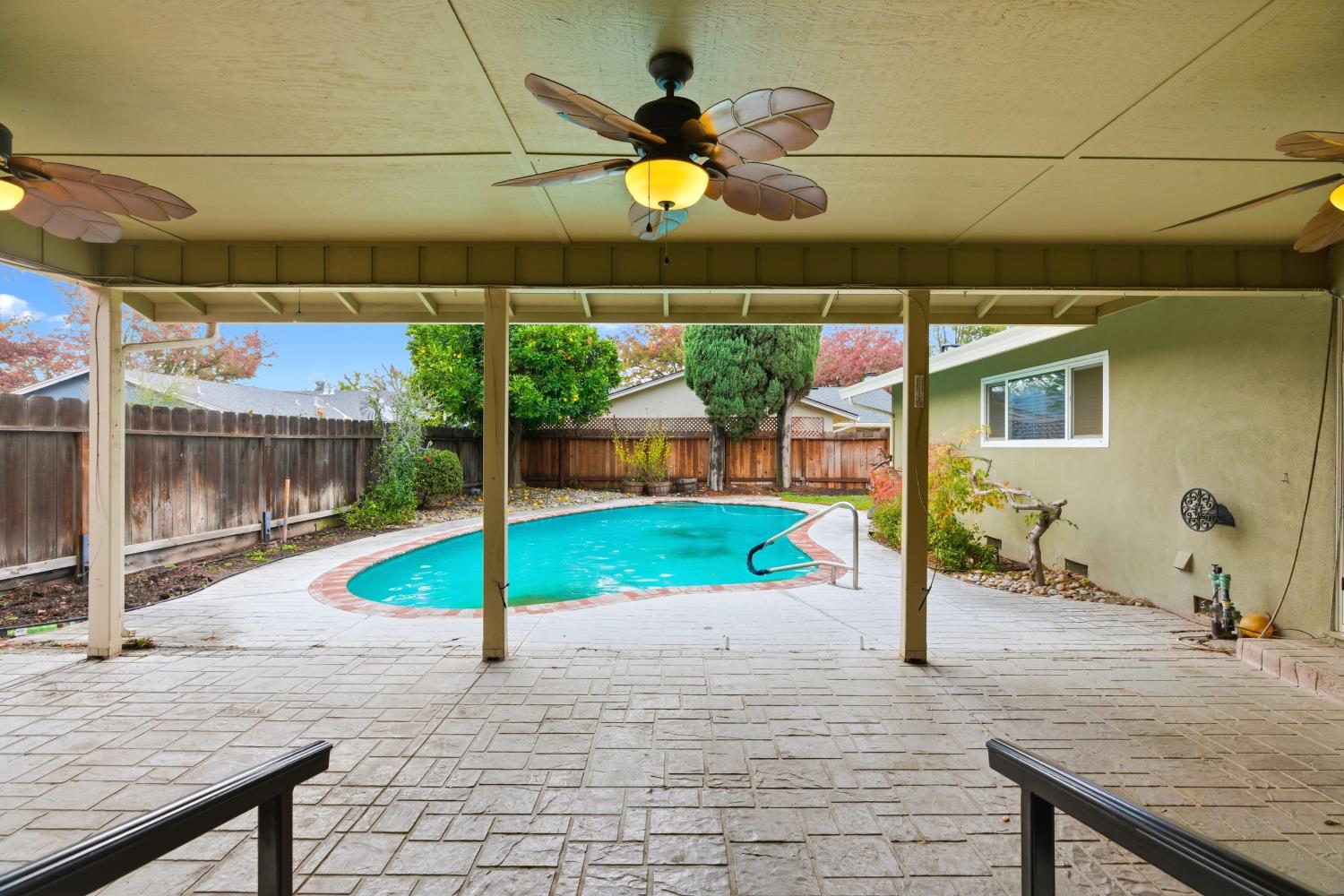 1416 Buttonwillow Drive Modesto, CA 95355 - Photo 27 of 39 a backyard of a house with table and chairs