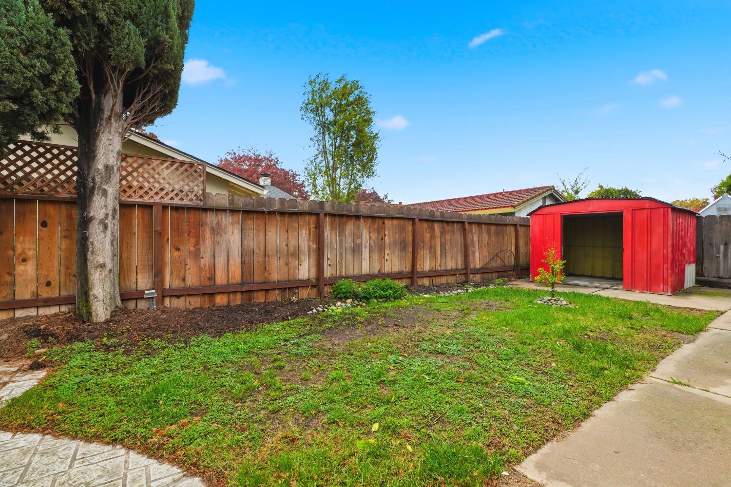1416 Buttonwillow Drive Modesto, CA 95355 - Photo 38 of 39 a view of backyard with green space