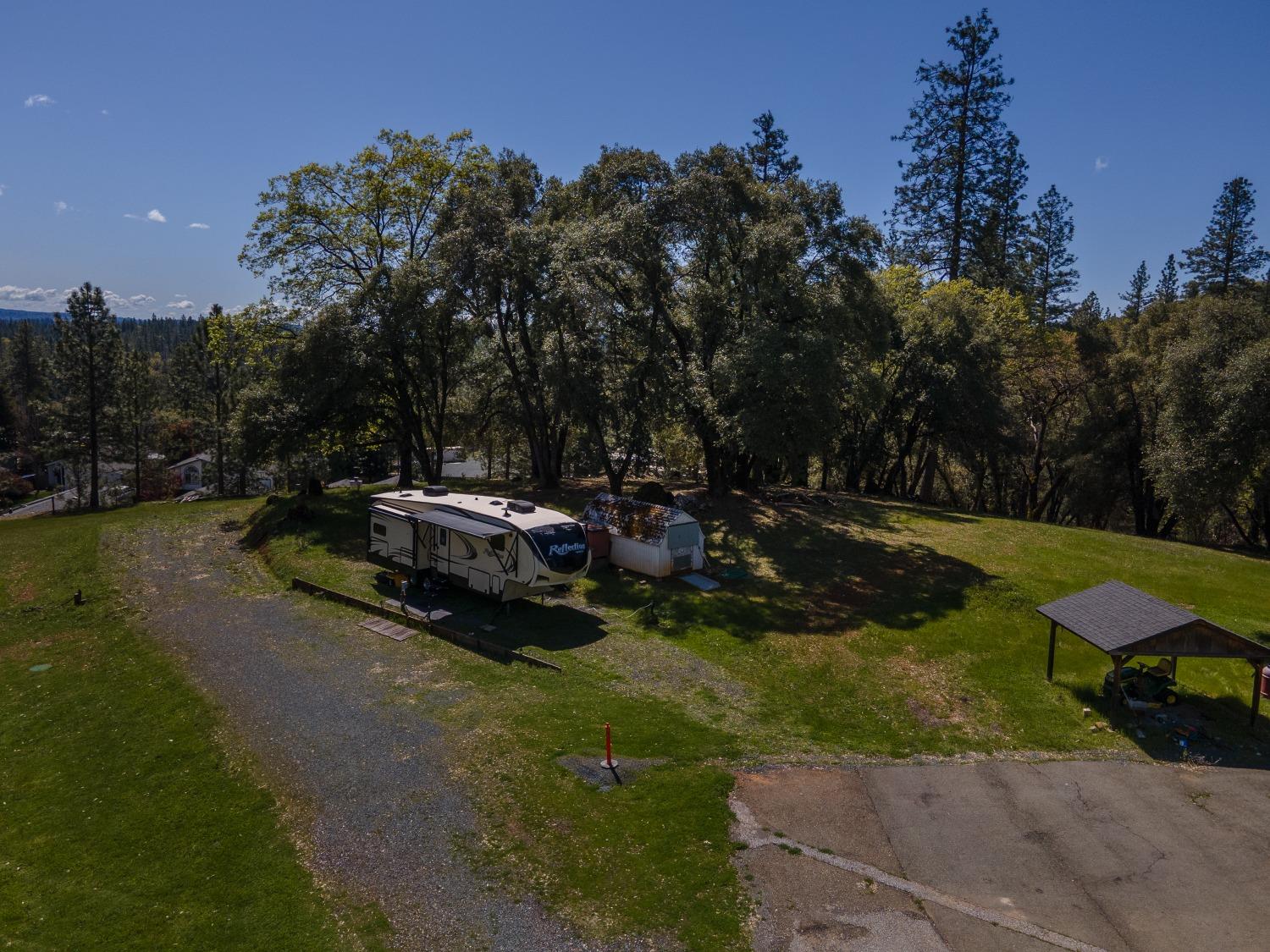 155 Whitcomb Avenue Colfax, CA 95713 - Photo 11 of 30 a car parked in the middle of a lake