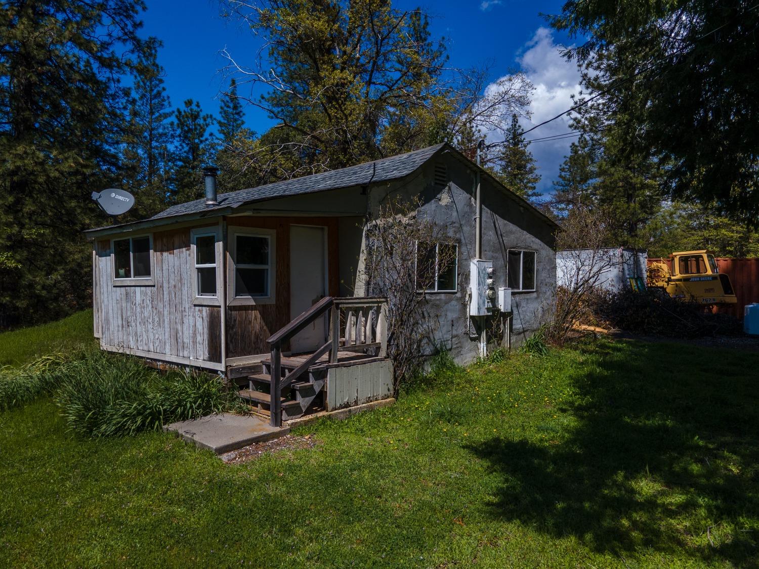 155 Whitcomb Avenue Colfax, CA 95713 - Photo 17 of 30 a view of a house with backyard and sitting area