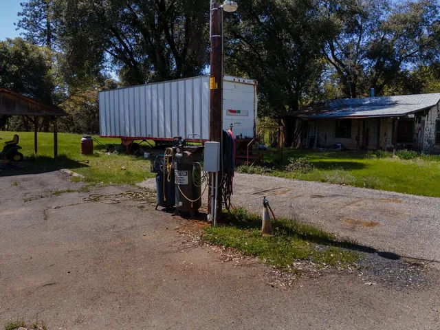 a childrens park with lots of swings and slides