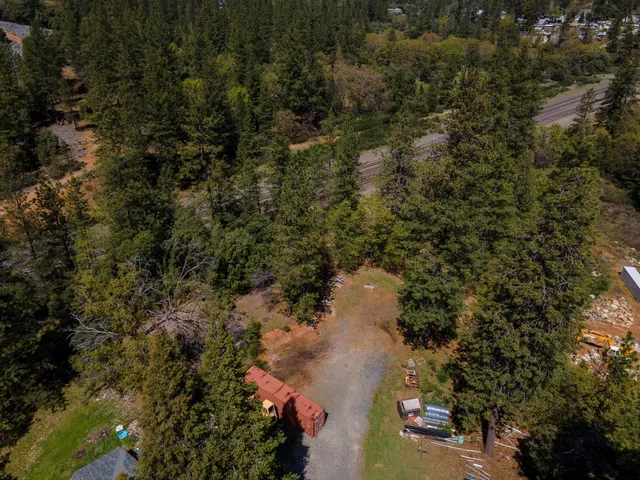 a view of a field with sitting area