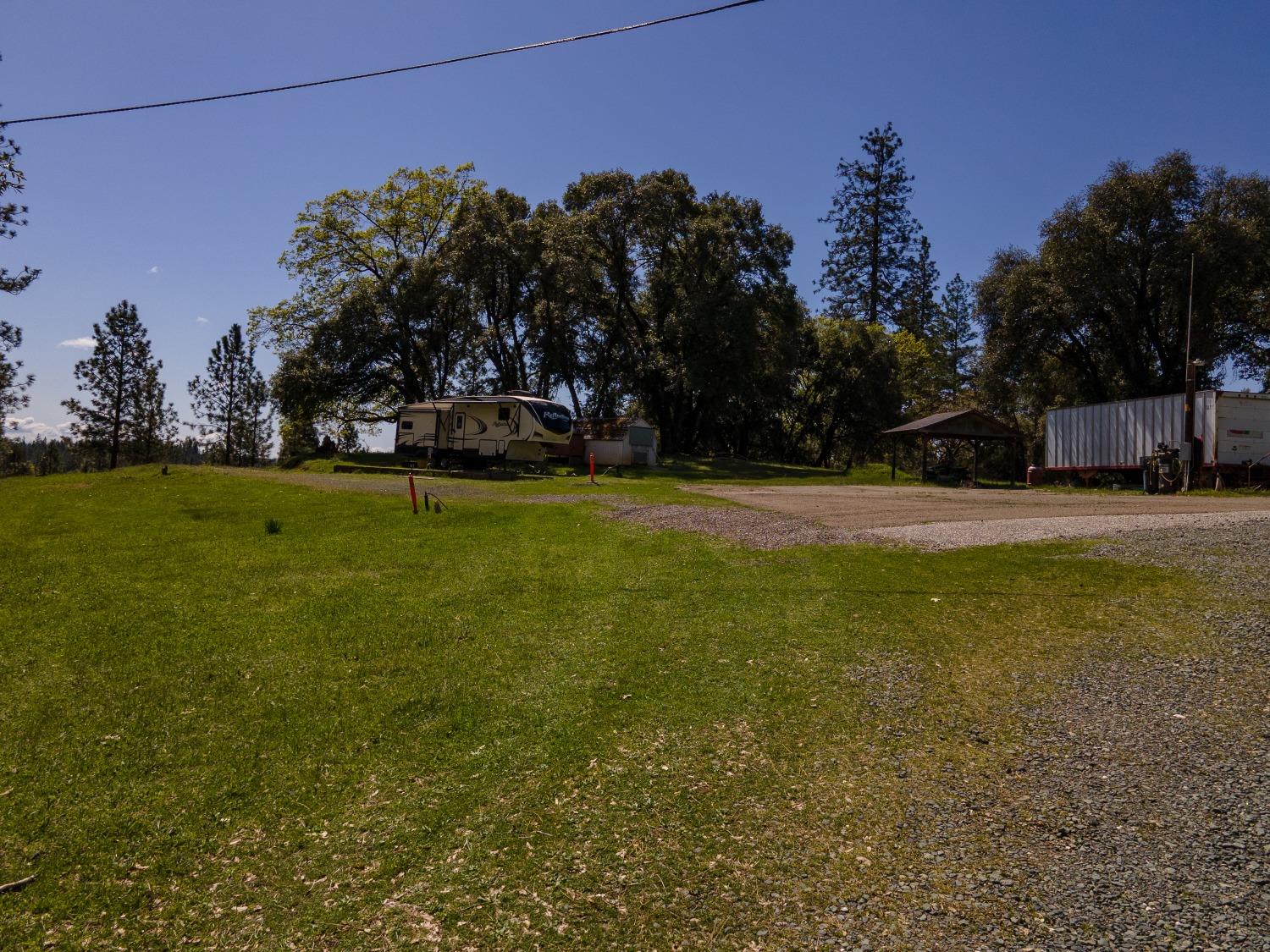 155 Whitcomb Avenue Colfax, CA 95713 - Photo 5 of 30 a view of a field of grass and trees