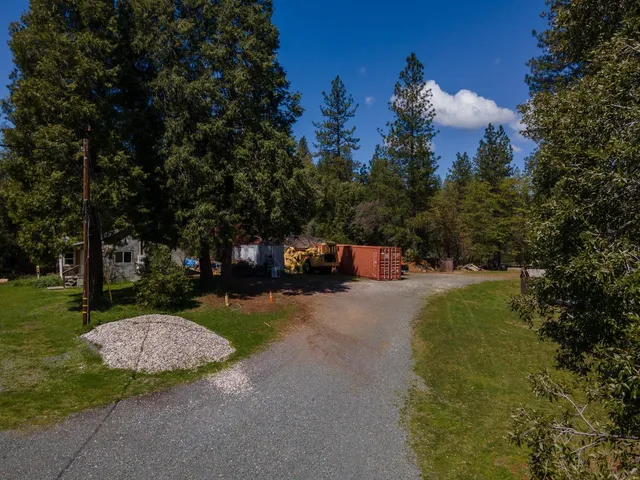 a view of a street with houses
