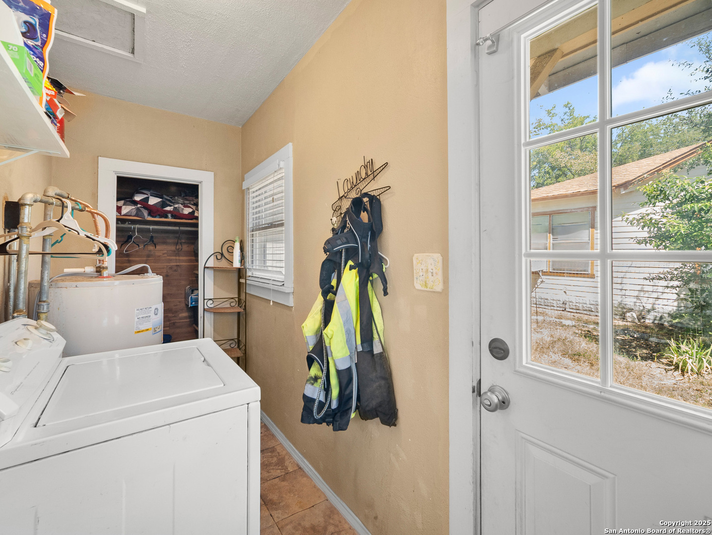 608 Ross Street Kerrville, TX 78028 - Photo 16 of 24 a utility room with dryer and washer