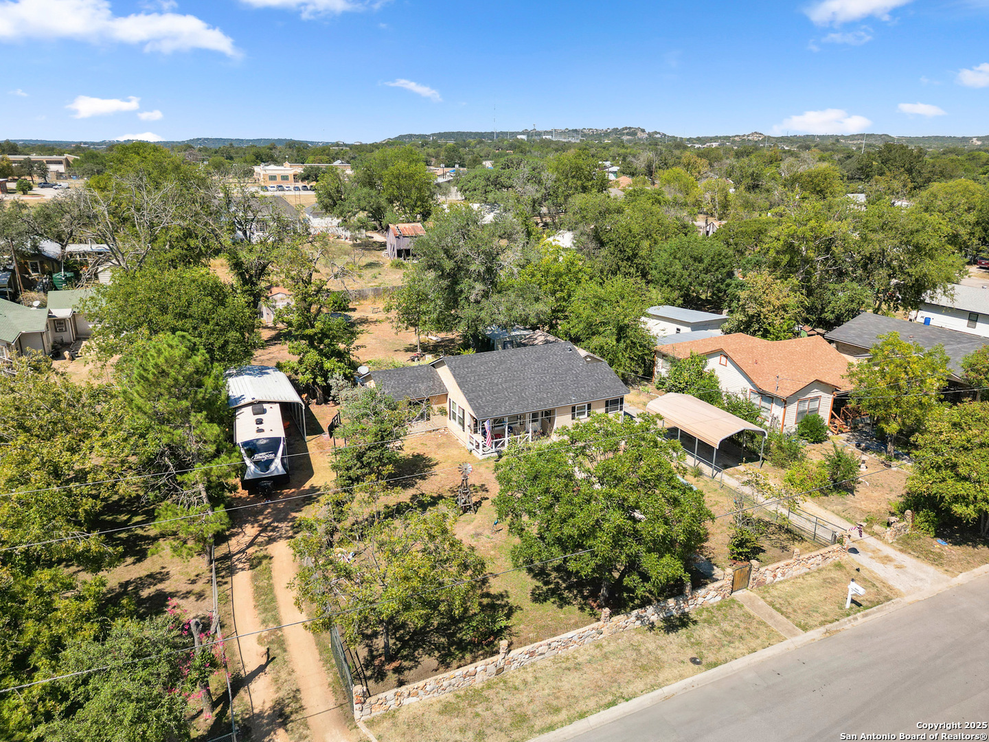 608 Ross Street Kerrville, TX 78028 - Photo 24 of 24 an aerial view of residential houses with outdoor space and trees