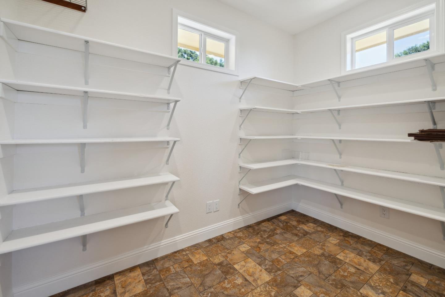 24475 Mountain Charlie Road Los Gatos, CA 95033 - Photo 11 of 69 a view of a room with shelf on the wall