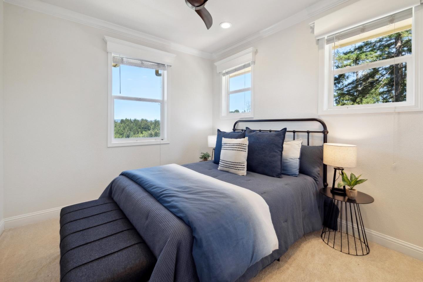 24475 Mountain Charlie Road Los Gatos, CA 95033 - Photo 14 of 69 a bedroom with bed and a window