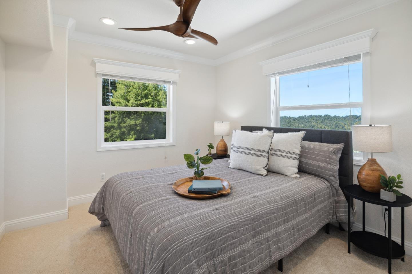 24475 Mountain Charlie Road Los Gatos, CA 95033 - Photo 17 of 69 a bedroom with a bed a bed and a window