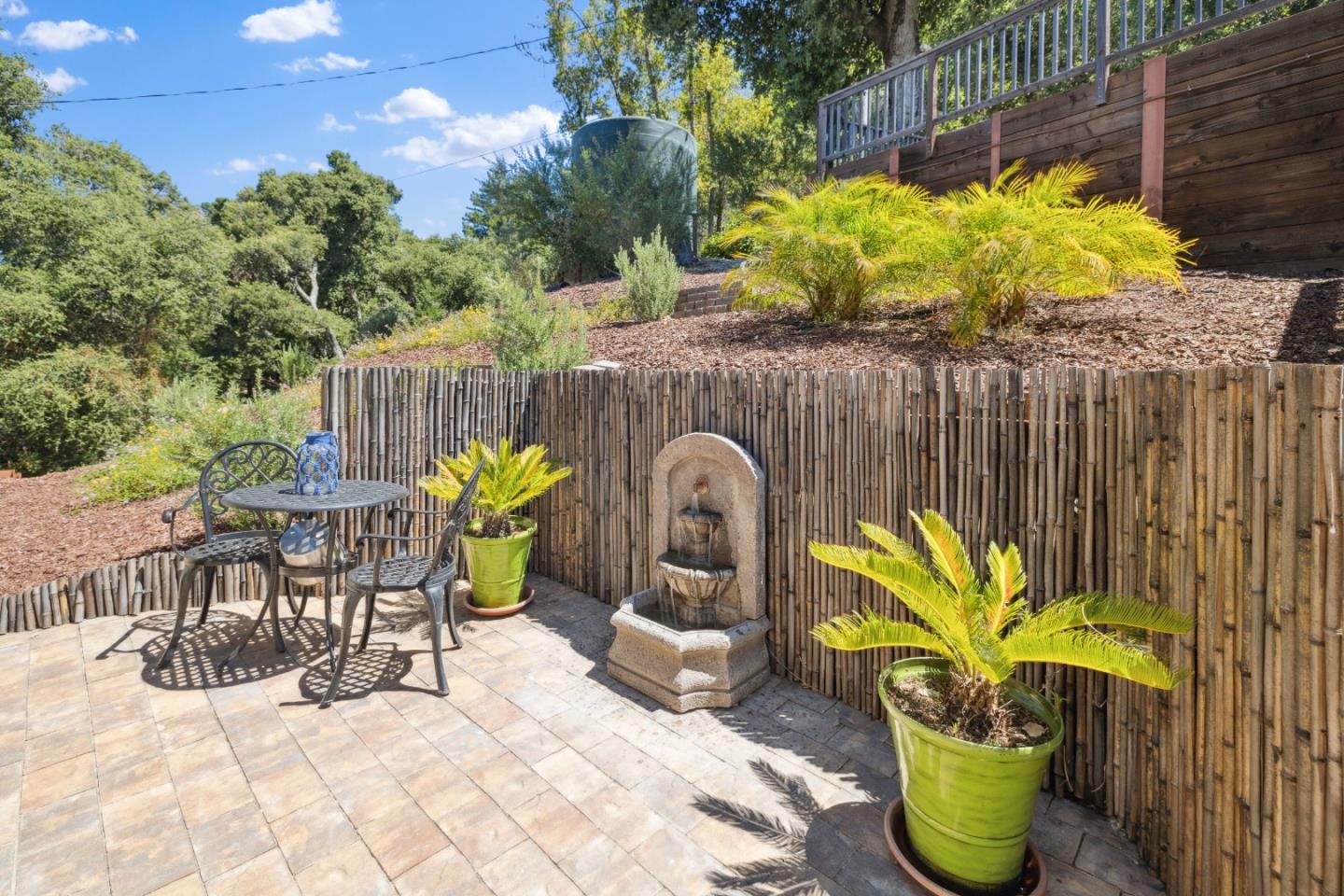24475 Mountain Charlie Road Los Gatos, CA 95033 - Photo 27 of 69 a view of a chairs and table in the patio