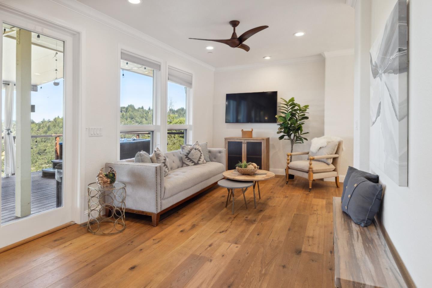 24475 Mountain Charlie Road Los Gatos, CA 95033 - Photo 3 of 69 a living room with furniture and a flat screen tv