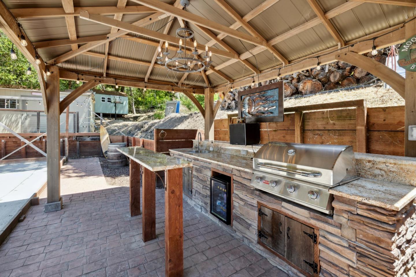 24475 Mountain Charlie Road Los Gatos, CA 95033 - Photo 33 of 69 a view of a kitchen with a stove and a table