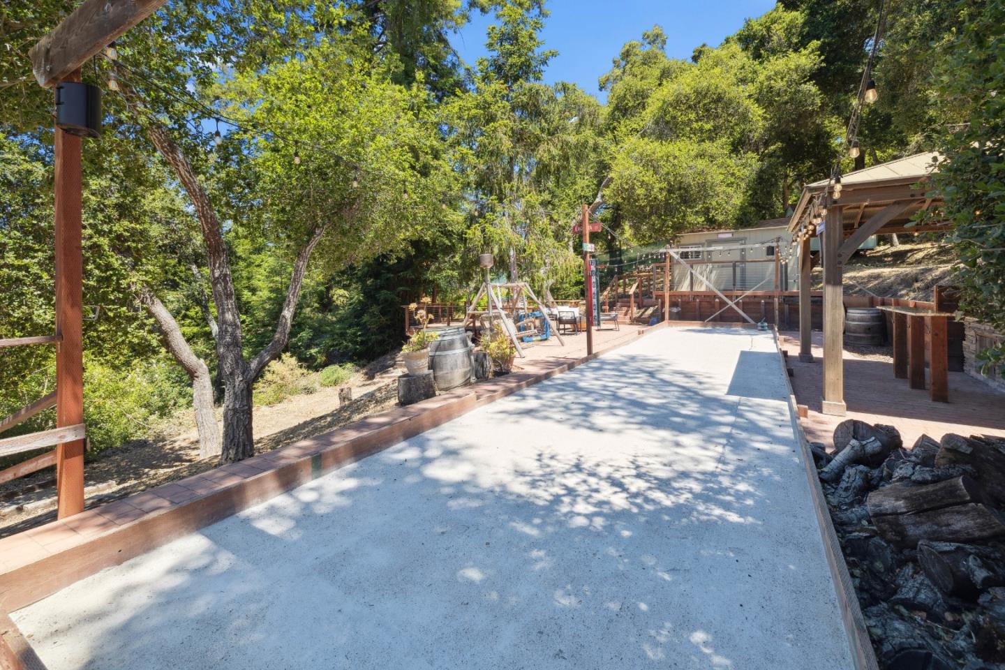 24475 Mountain Charlie Road Los Gatos, CA 95033 - Photo 35 of 69 a view of a yard with plants and trees