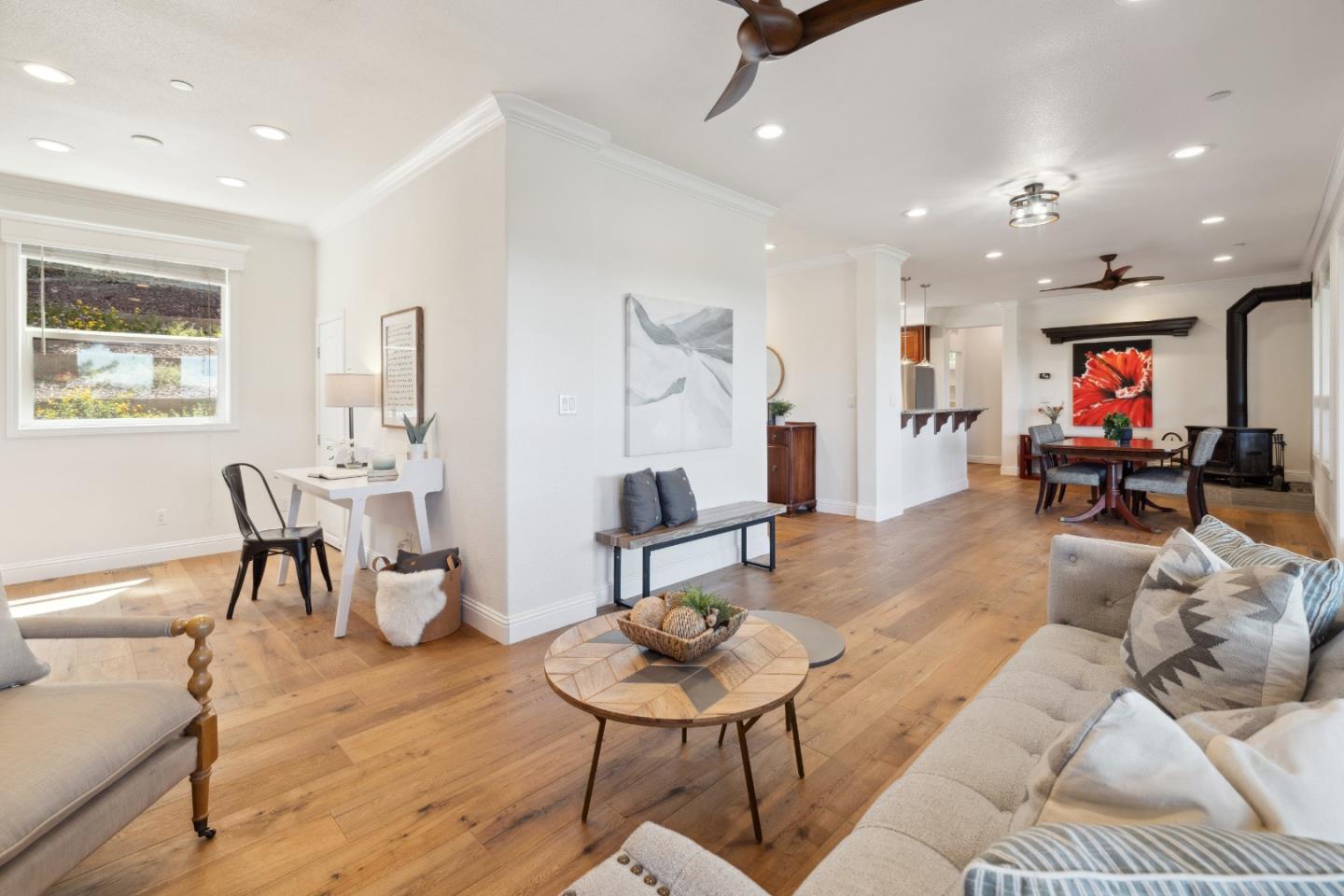 24475 Mountain Charlie Road Los Gatos, CA 95033 - Photo 4 of 69 a living room with furniture and a flat screen tv