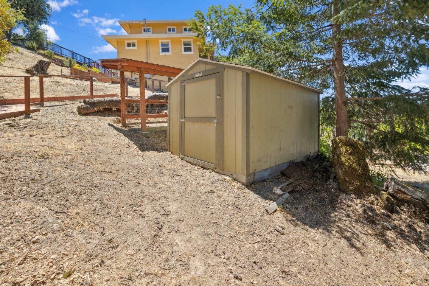 24475 Mountain Charlie Road Los Gatos, CA 95033 - Photo 43 of 69 a side view of a house with a snow in the yard