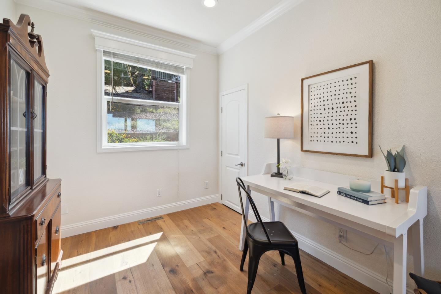 24475 Mountain Charlie Road Los Gatos, CA 95033 - Photo 5 of 69 a view of a workspace with furniture and a window