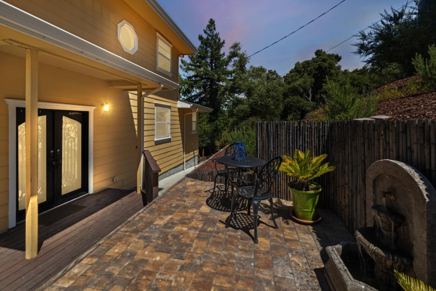 24475 Mountain Charlie Road Los Gatos, CA 95033 - Photo 53 of 69 a view of a chairs in patio with wooden fence