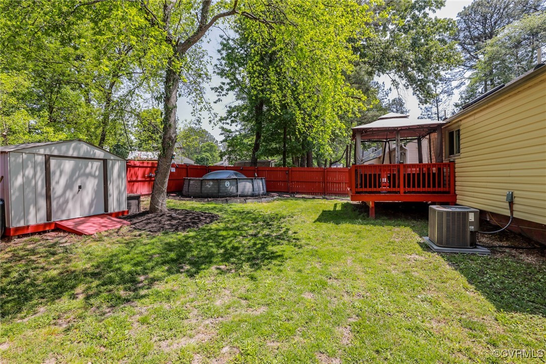 6812 Fairpines Road Chesterfield, VA 23832 - Photo 35 of 43 a view of backyard with deck and garden
