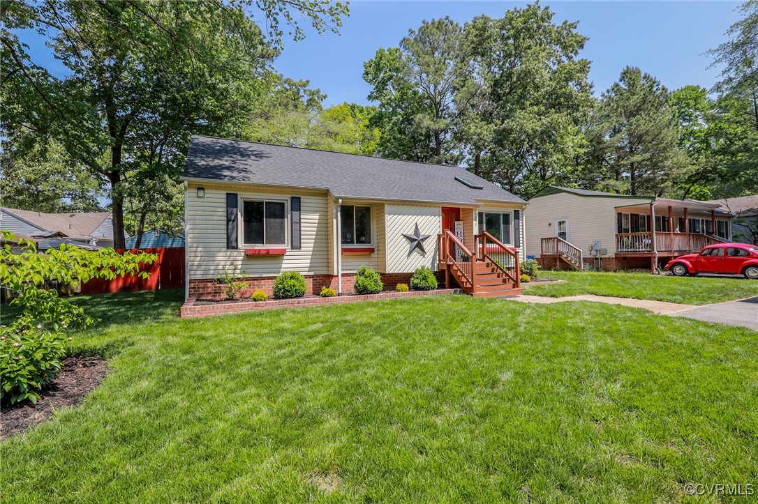 6812 Fairpines Road Chesterfield, VA 23832 - Photo 6 of 43 a front view of house with yard and outdoor seating