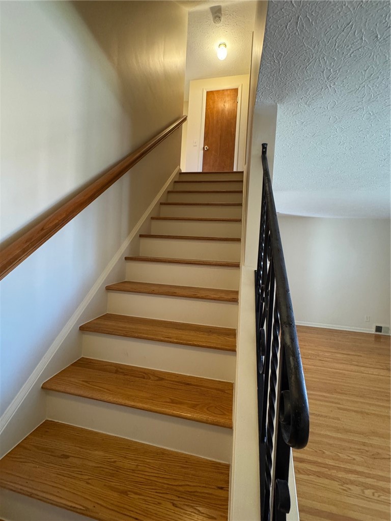 16 Summit Street Perinton, NY 14450 - Photo 13 of 49 Staircase to Bedrooms
