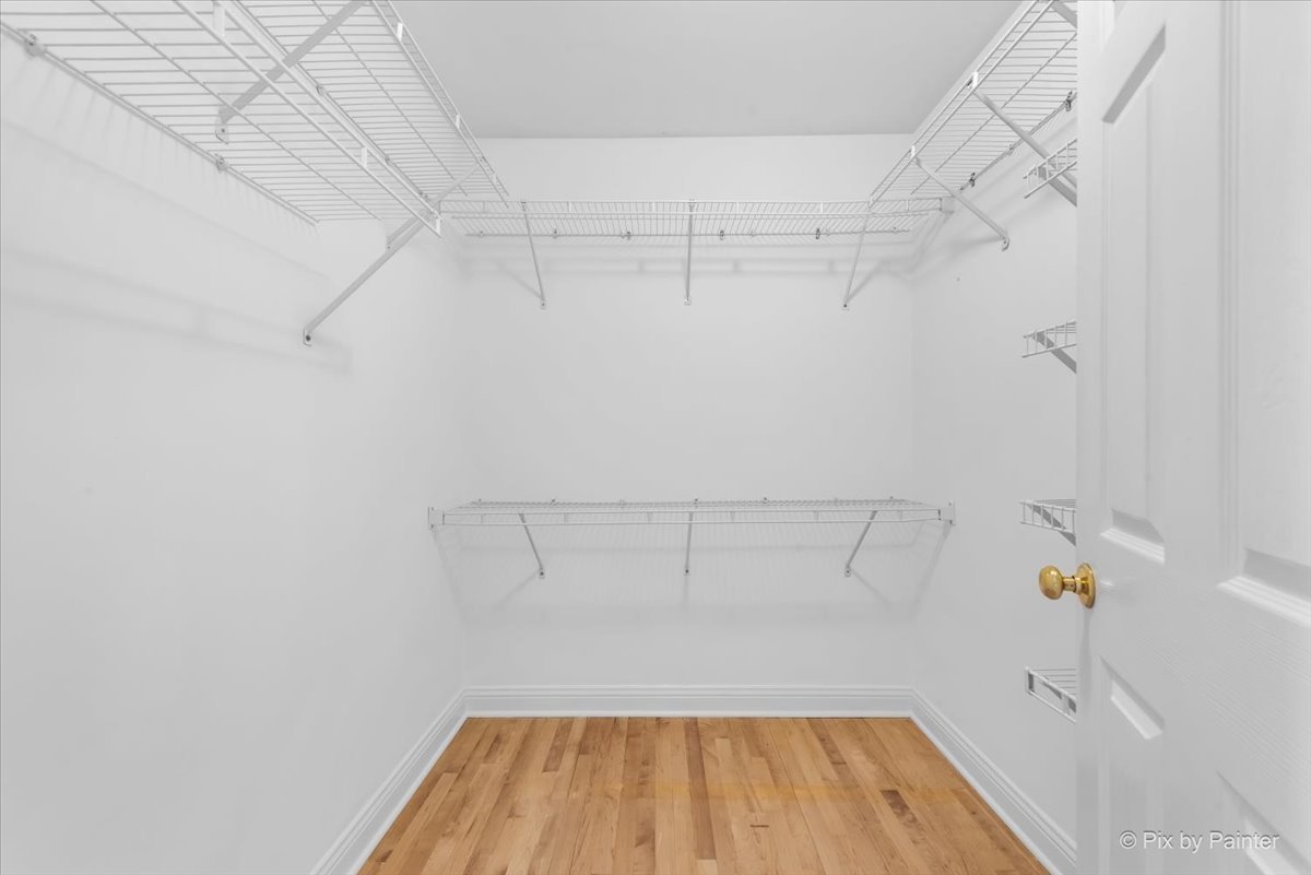 827 Riding Lane, Unit 827 St. Charles, IL 60174 - Photo 24 of 40 a view of a room with racks on the wall