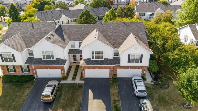 an aerial view of a house with garden