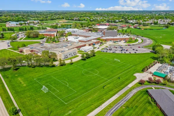 a view of a house with a big yard