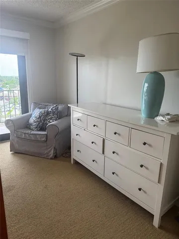 a view of livingroom with furniture and windows