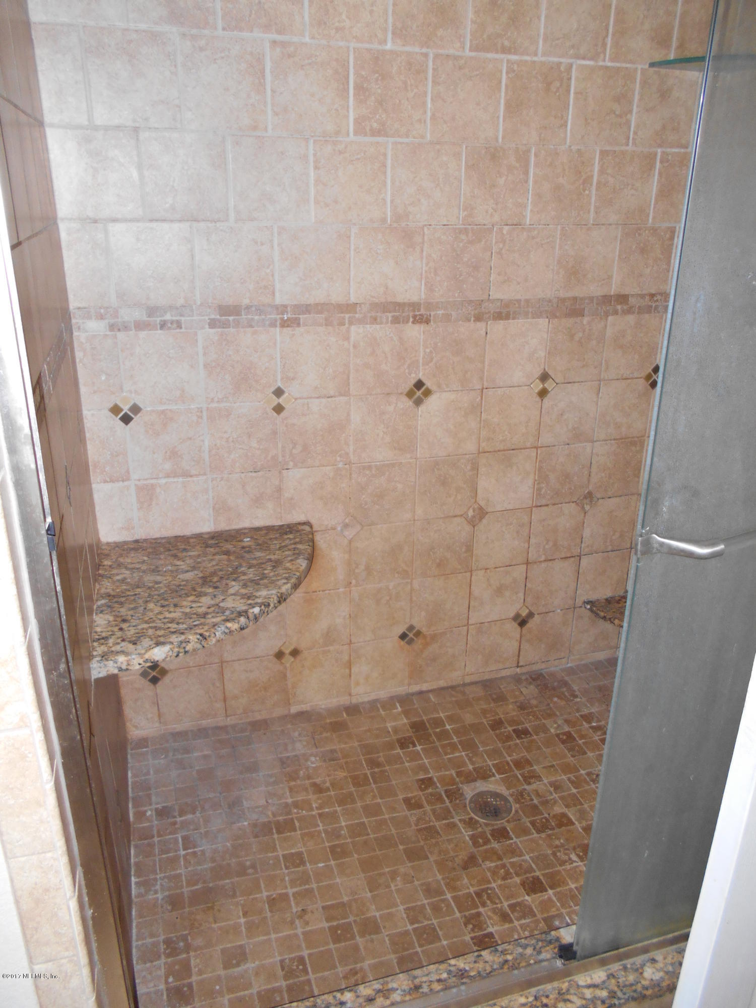 3006 Holly Road Orange Park, FL 32065 - Photo 14 of 19 a bathroom with a shower