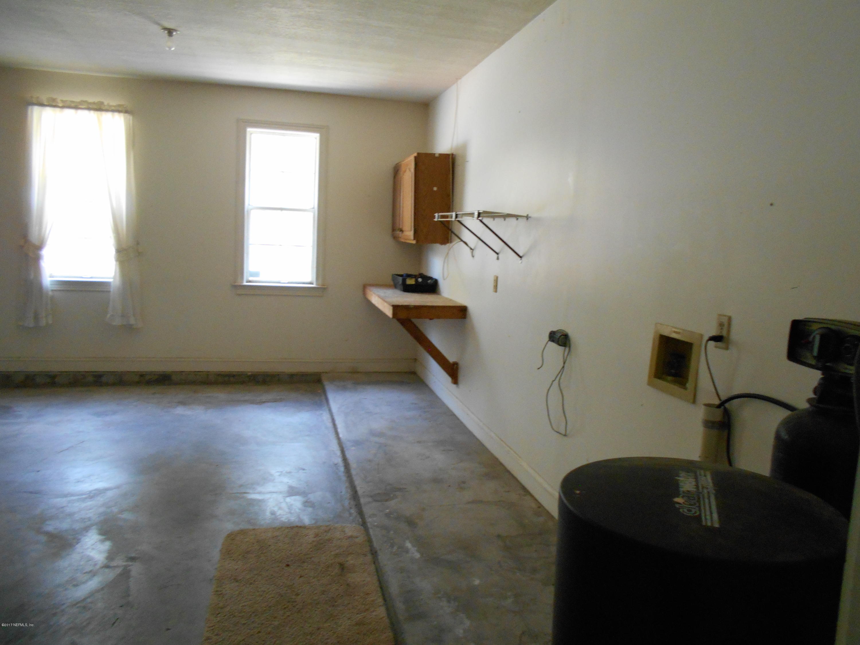 3006 Holly Road Orange Park, FL 32065 - Photo 18 of 19 a view of a sink and a window in a room