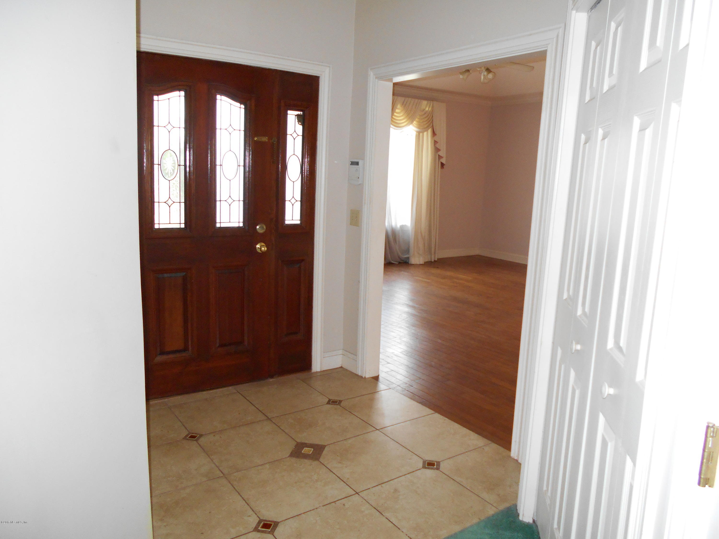 3006 Holly Road Orange Park, FL 32065 - Photo 4 of 19 a view of entryway with wooden floor