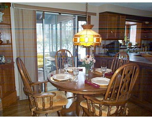 958 Salem End Road Framingham, MA 01702 - Photo 15 of 22 a view of a dining room with furniture and chandelier