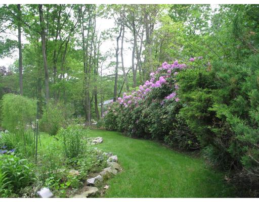 958 Salem End Road Framingham, MA 01702 - Photo 19 of 22 a view of a flower garden in a backyard