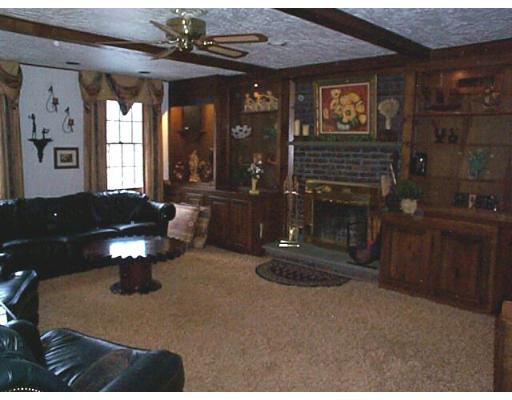 958 Salem End Road Framingham, MA 01702 - Photo 5 of 22 a living room with furniture and a fireplace