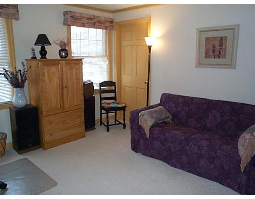 958 Salem End Road Framingham, MA 01702 - Photo 10 of 22 a living room with furniture and a window