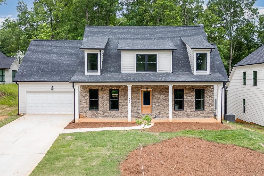 front view of a house with a yard
