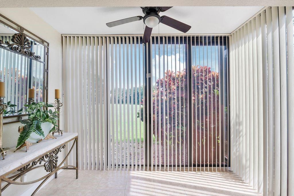 21452 Juego Circle, Unit 31A Boca Raton, FL 33433 - Photo 18 of 38 a view of a balcony with furniture