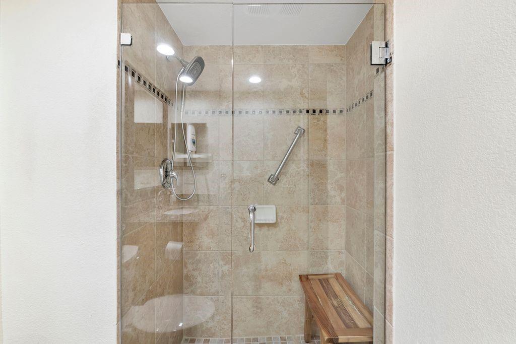 21452 Juego Circle, Unit 31A Boca Raton, FL 33433 - Photo 28 of 38 a bathroom with a shower