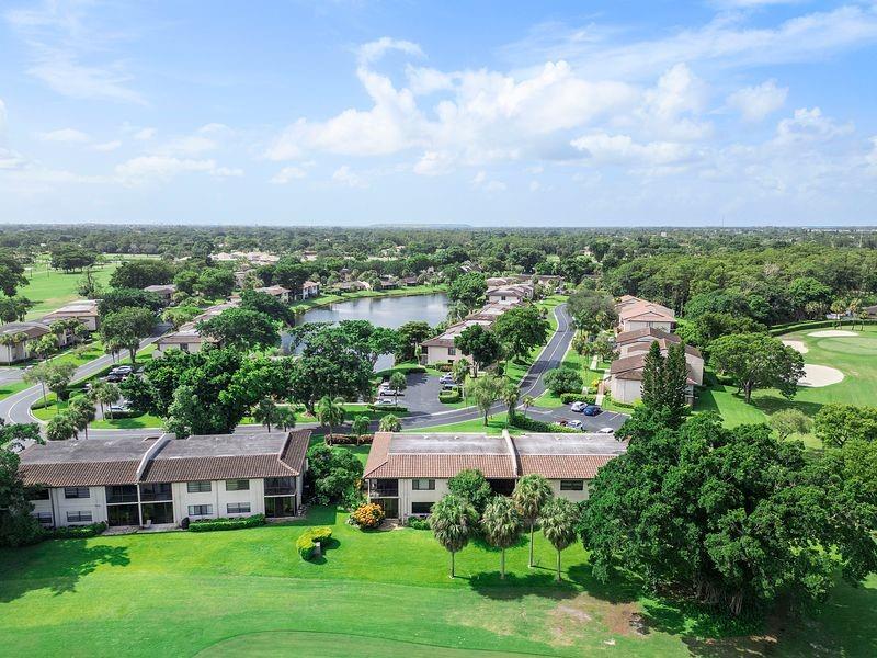 21452 Juego Circle, Unit 31A Boca Raton, FL 33433 - Photo 29 of 38 an aerial view of a house with a garden view