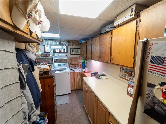 a storage room with washer and dryer