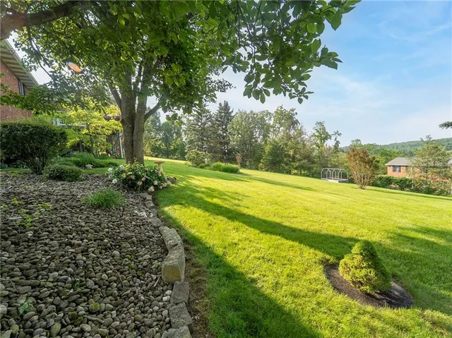 a swimming pool with wooden fence