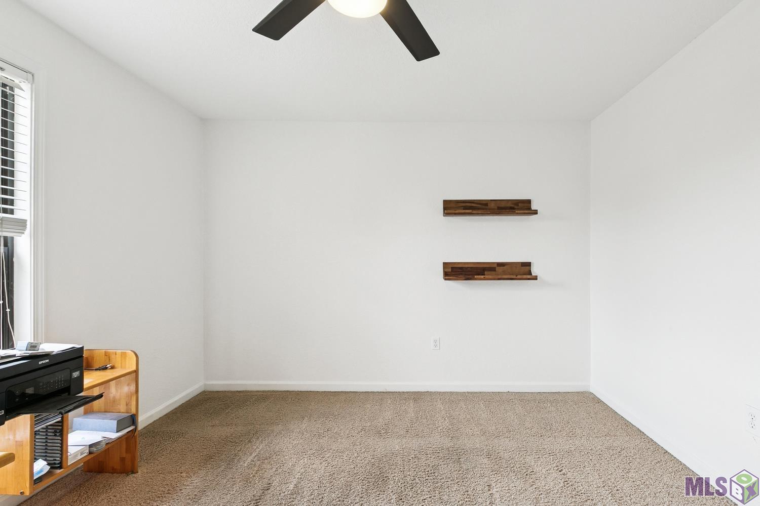 10302 West Winston Avenue, Unit 11 Baton Rouge, LA 70809 - Photo 9 of 18 Second Bedroom