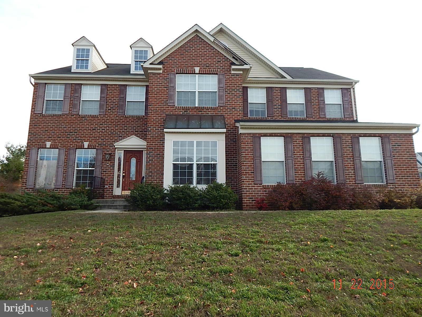 14411 Autumn Rust Road Boyds, MD 20841 - Photo 1 of 30 a front view of a house with garden