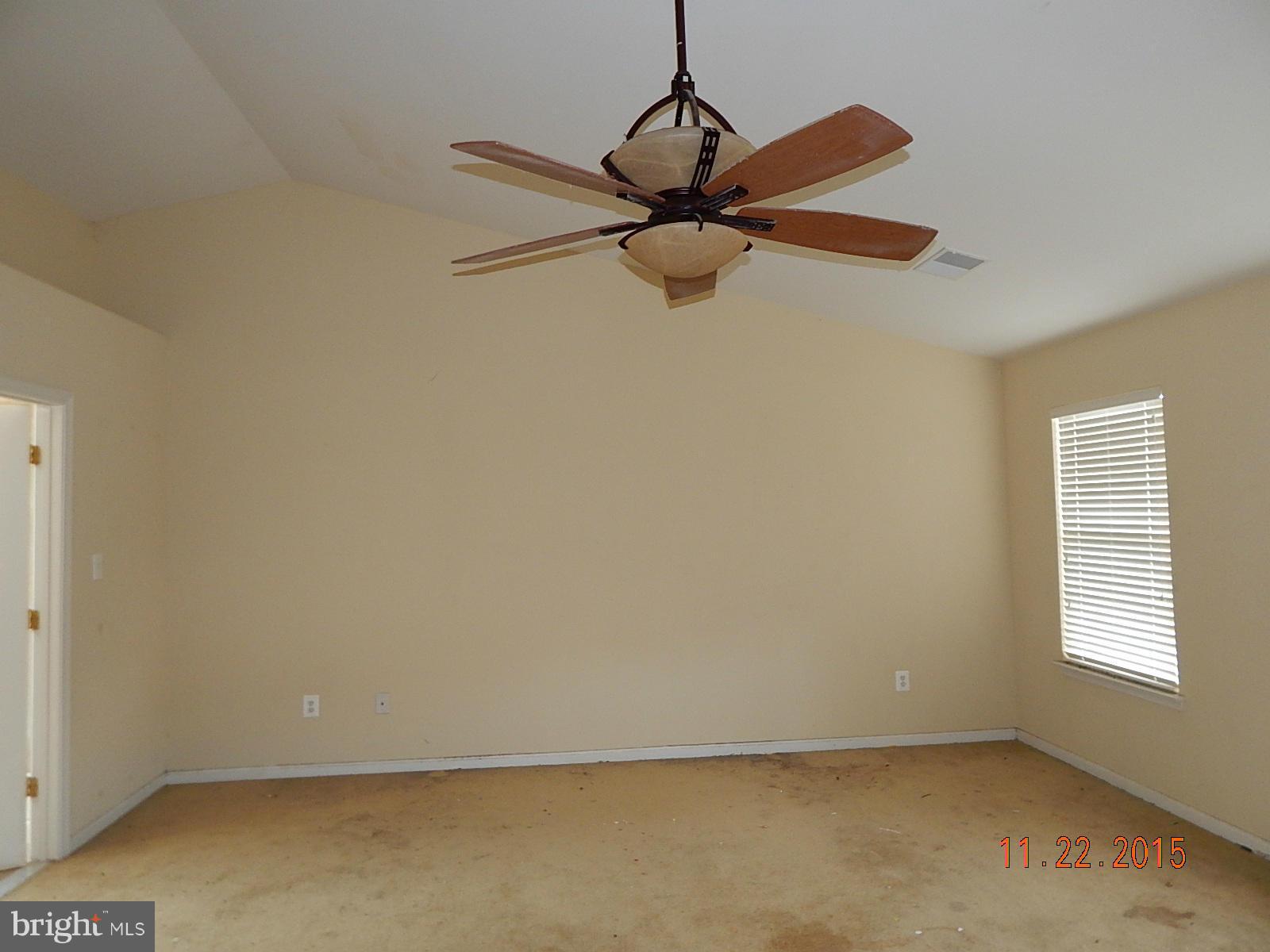 14411 Autumn Rust Road Boyds, MD 20841 - Photo 14 of 30 an empty room with a window and a fan