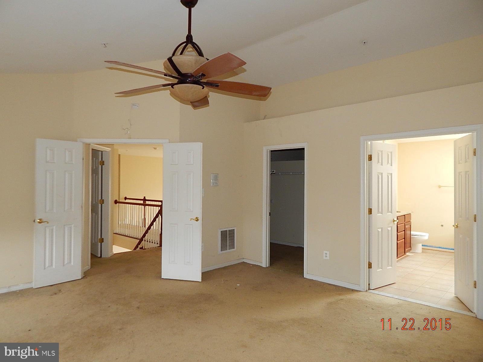 14411 Autumn Rust Road Boyds, MD 20841 - Photo 15 of 30 a view of a room with a fan and a ceiling fan
