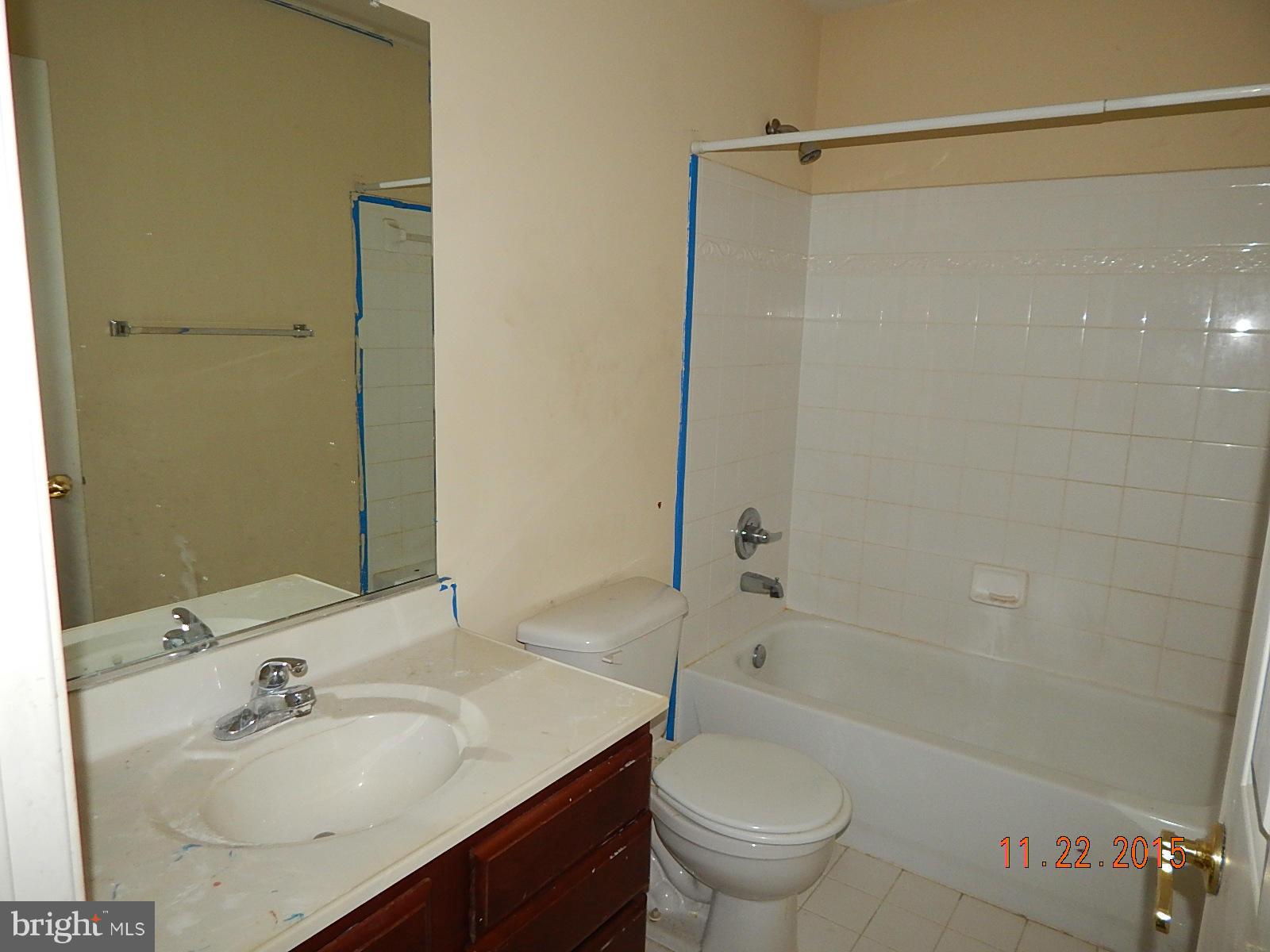 14411 Autumn Rust Road Boyds, MD 20841 - Photo 20 of 30 a bathroom with a sink toilet and shower