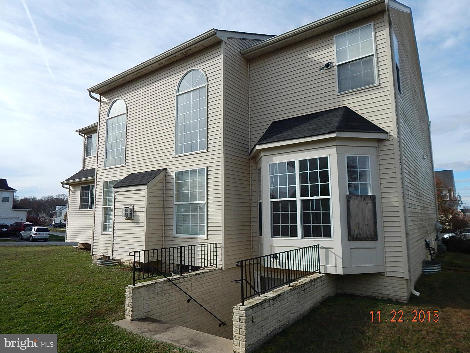 14411 Autumn Rust Road Boyds, MD 20841 - Photo 29 of 30 a front view of a house with a yard