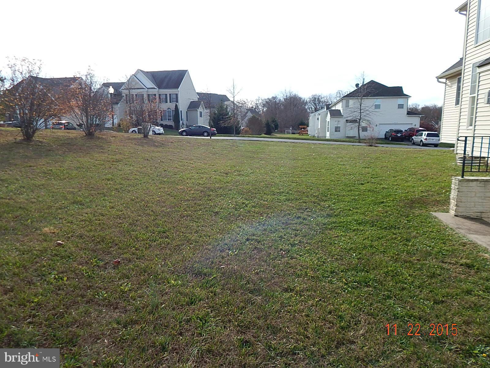 14411 Autumn Rust Road Boyds, MD 20841 - Photo 30 of 30 a view of a big house with a big yard and large trees