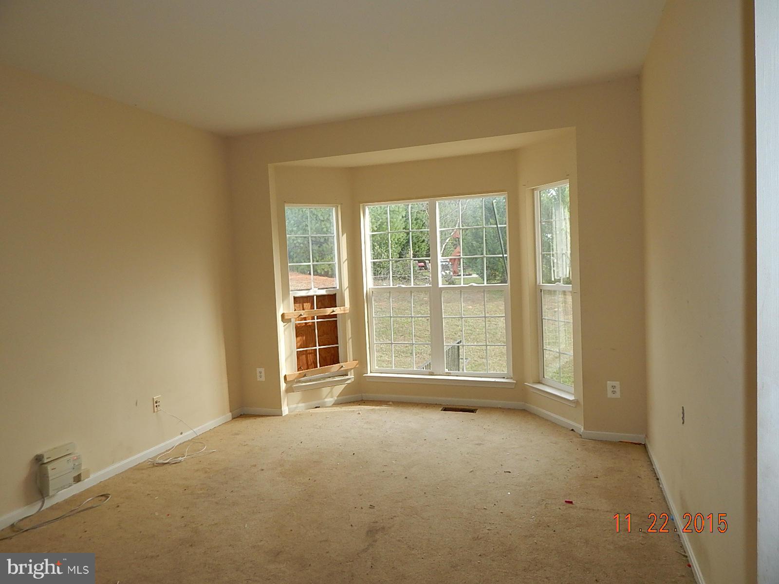 14411 Autumn Rust Road Boyds, MD 20841 - Photo 6 of 30 a view of an empty room with a window